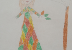 Praca ucznia przedstawiająca kobietę-Panią Jesień w ubraniu w kolorach : czerwony, żółty, brązowy