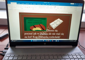 Praca ucznia klasy 3b w programie Paint i Word- projekt reklamy produktu.